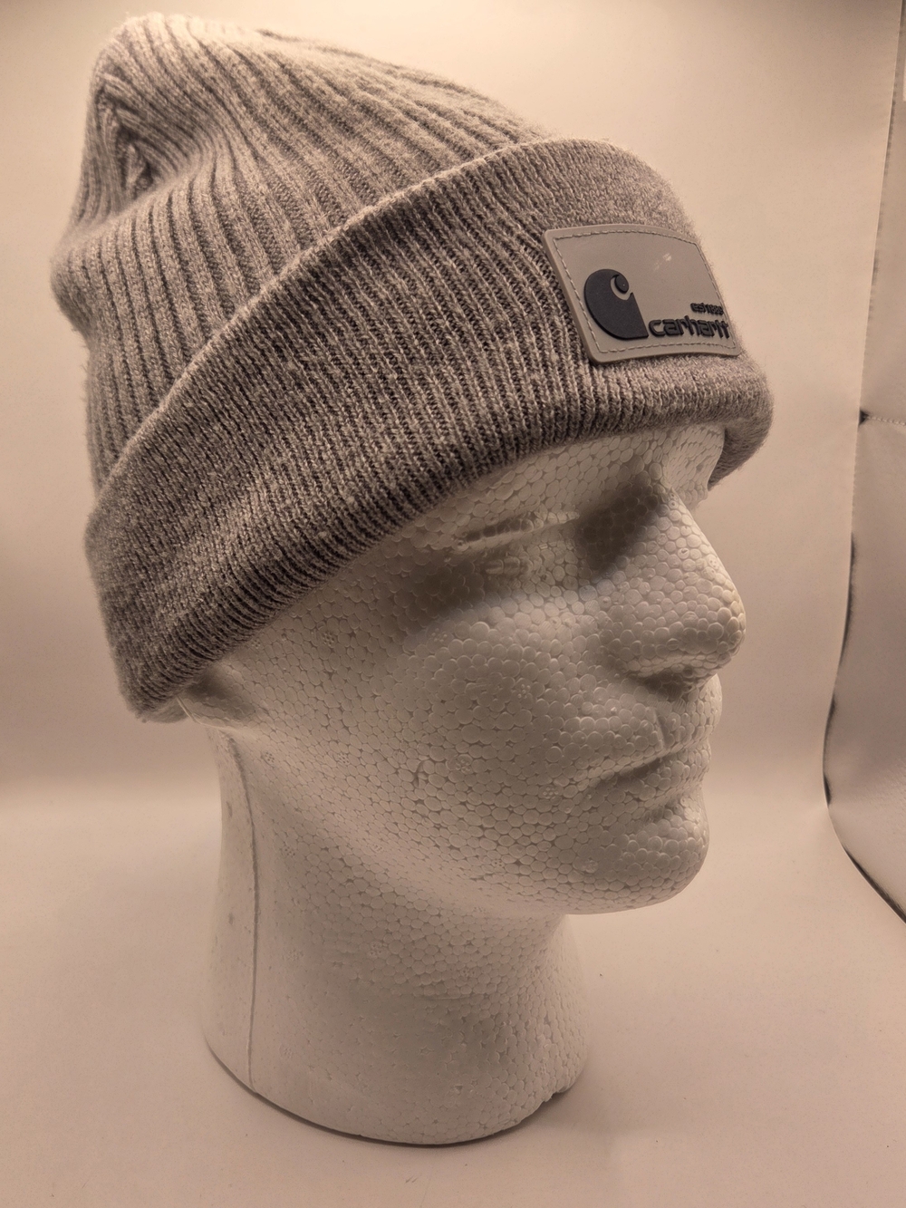 Carhartt rib-knit beanie with a matching tonal logo